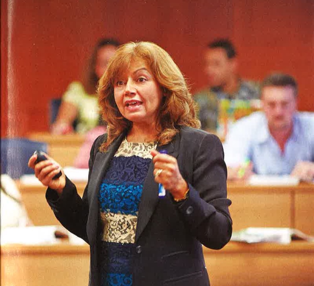 Dr. Pissaris teaching an MBA class, as featured in Florida Trend